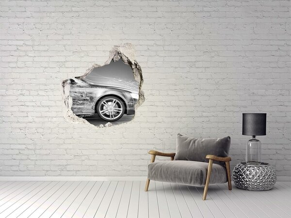 Autocolant un zid spart cu priveliște O mașină trece printr-un perete