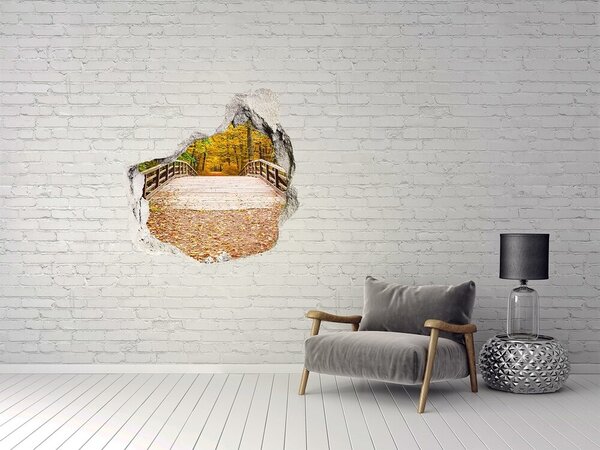 Fototapet 3D gaură în perete Un pod în pădurea de toamnă