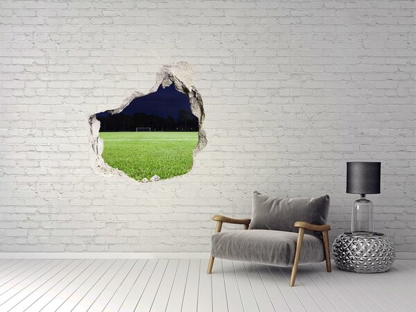 Fototapet 3D gaură în perete Teren de fotbal noaptea