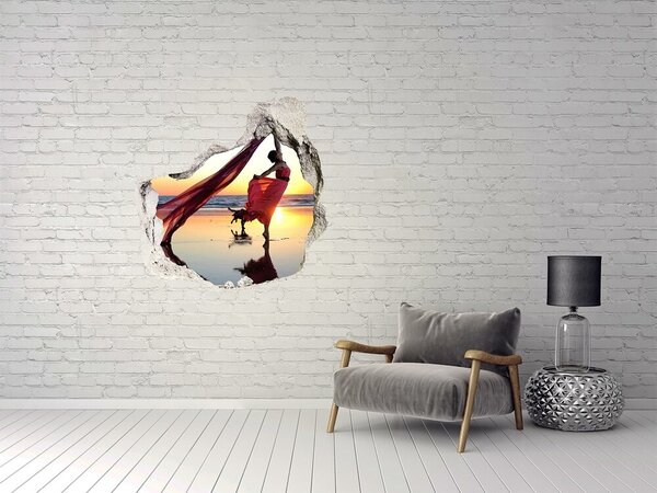 Fototapet 3D gaură în perete Dansând pe plajă la apus