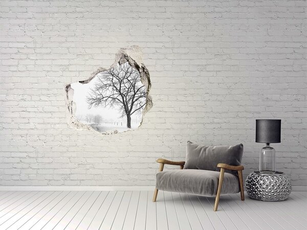 Fototapet 3D gaură în perete Peisaj de iarnă cu un copac