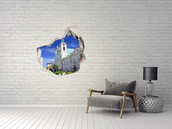 Fototapet un zid spart cu priveliște Biserica istorică din oraș