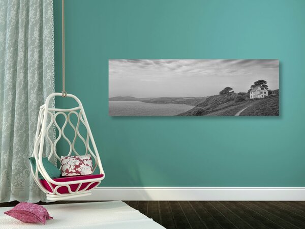 Tablou casa de pe stâncă în design alb-negru