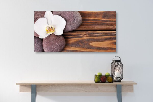 Tablou pietre wellness și orhidee pe fundalul din lemn
