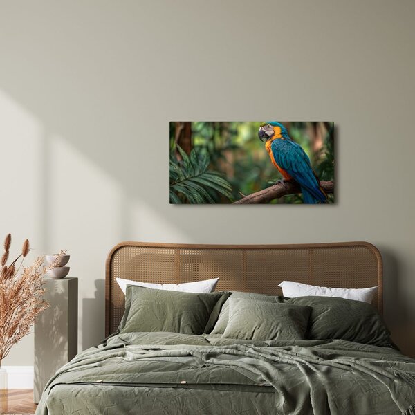 Tablou papagal printre frunze tropicale