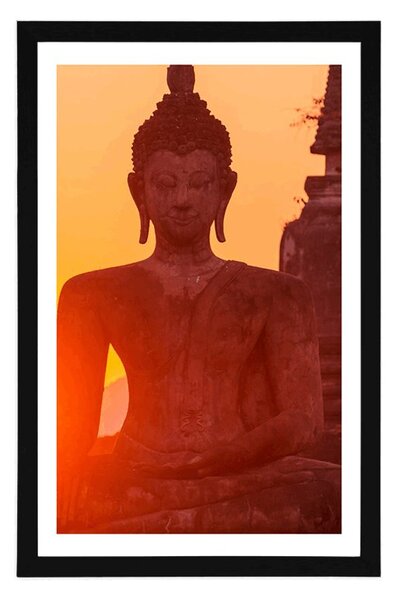 Poster cu passepartout statuie Buddha în mijlocul pietrelor