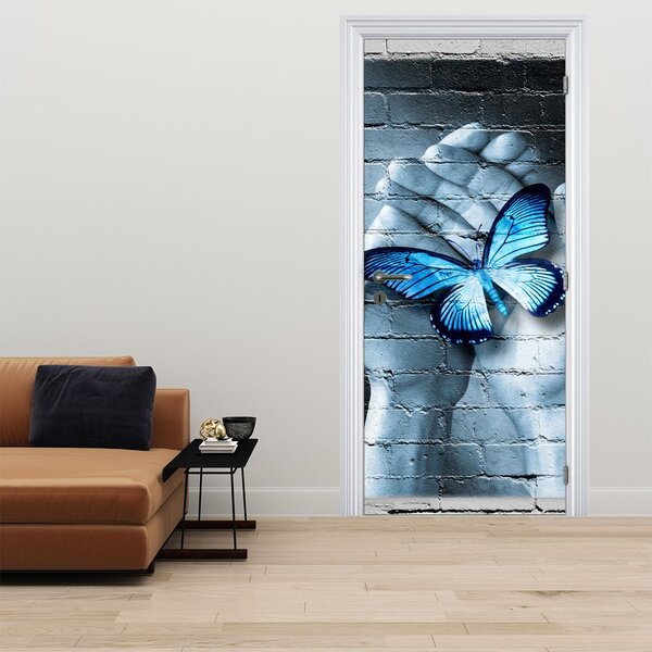 Fototapet pentru ușă - Fluture albastru pe perete (95x205cm)