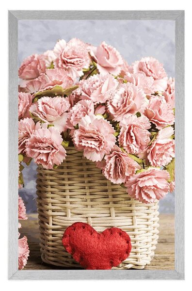 Poster buchet de garoafe roz într-un coș