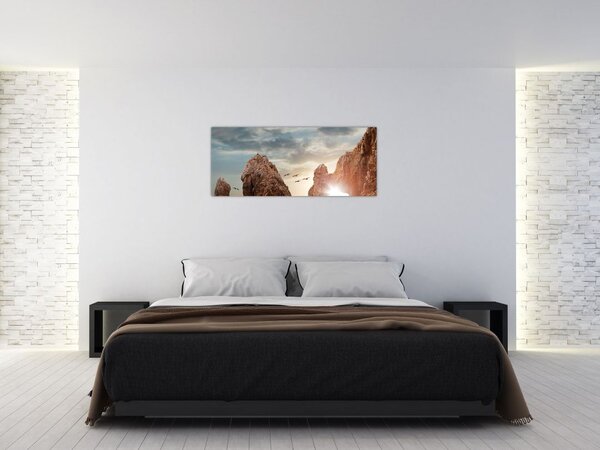 Tablou - Apus de soare peste stânci (120x50 cm)