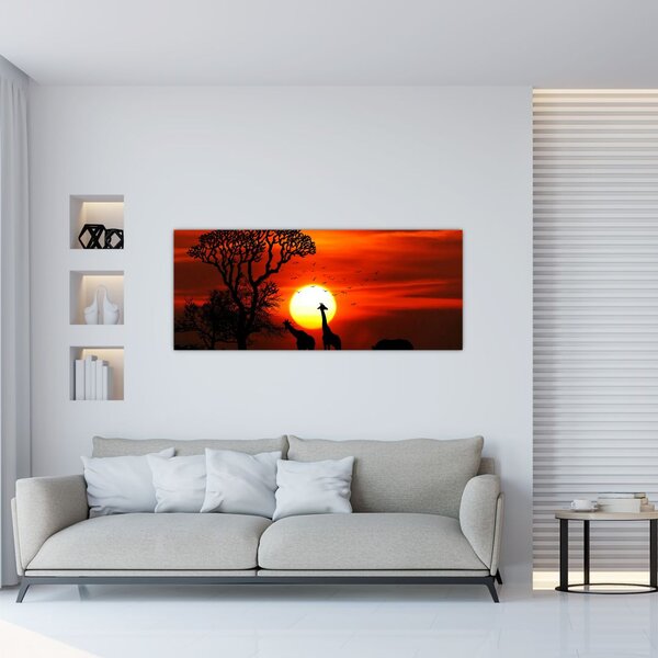 Tablou - Siluete animalelor la apus de soare (120x50 cm)