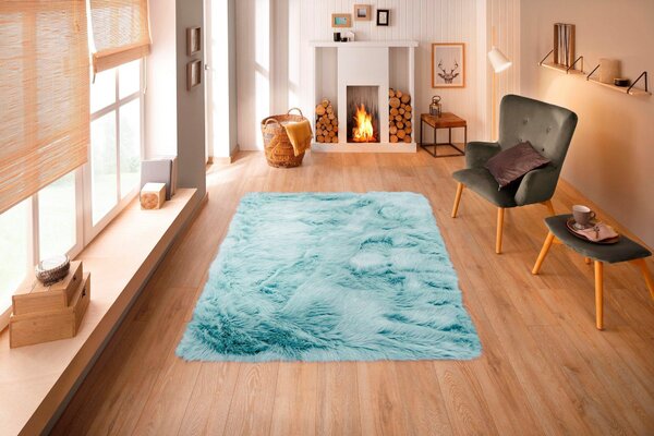 Covor Guido Maria Triana, blana artificiala, albastru, 60/90 cm