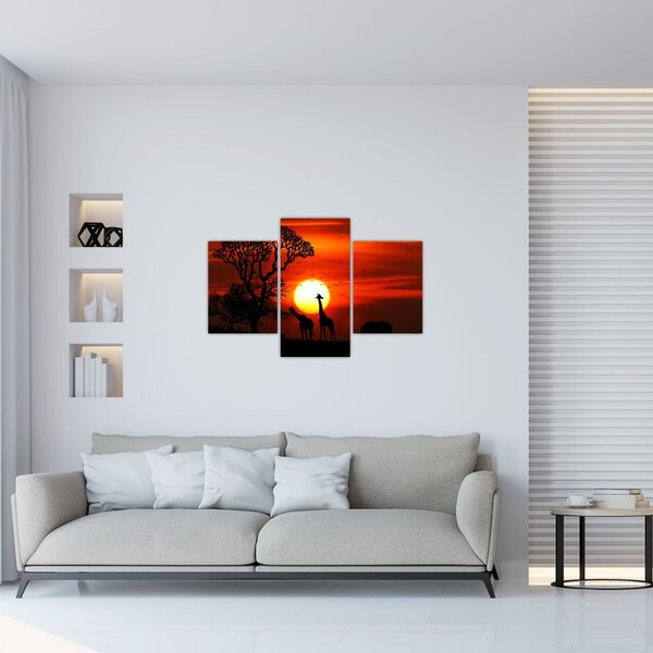 Tablou - Siluete animalelor la apus de soare (90x60 cm)