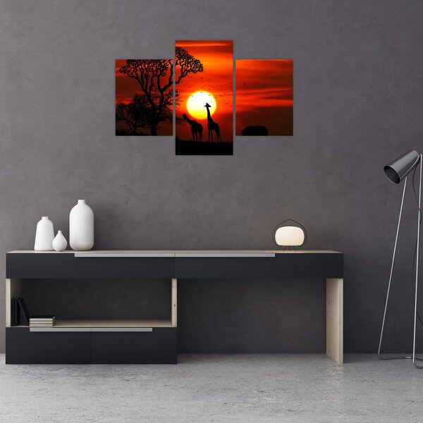 Tablou - Siluete animalelor la apus de soare (90x60 cm)