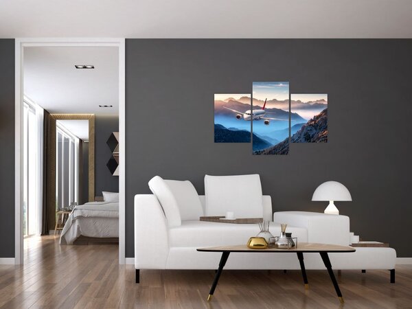 Tablou - Avion peste crestele montane (90x60 cm)