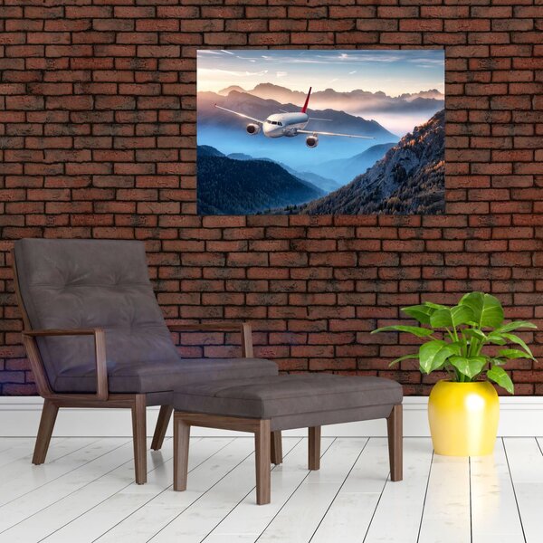 Tablou - Avion peste crestele montane (90x60 cm)