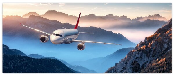 Tablou - Avion peste crestele montane (120x50 cm)