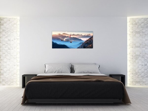 Tablou - Avion peste crestele montane (120x50 cm)