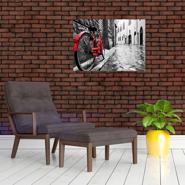 Tablou - Bicicleta roșie pe o stradă pavată (70x50 cm)