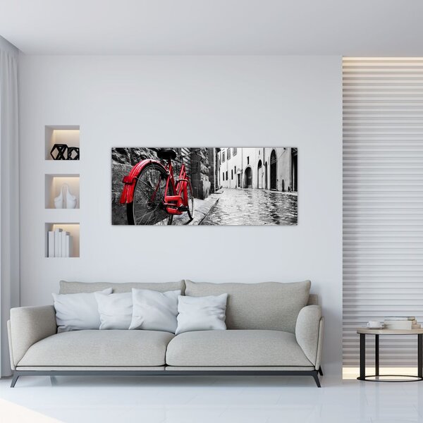 Tablou - Bicicleta roșie pe o stradă pavată (120x50 cm)