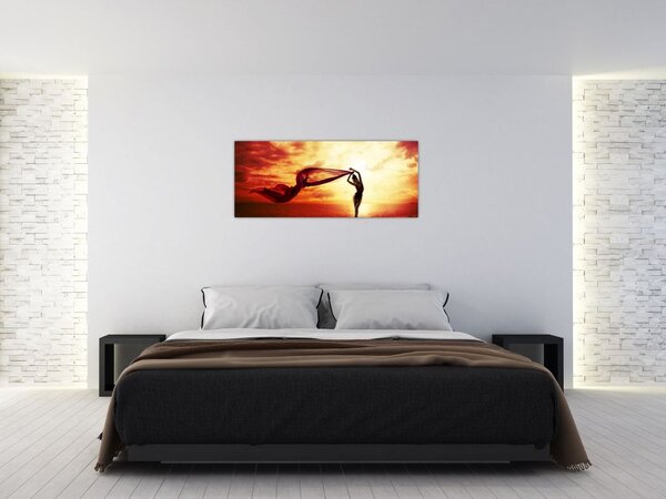 Tablou - Silueta femeii la apus de soare (120x50 cm)