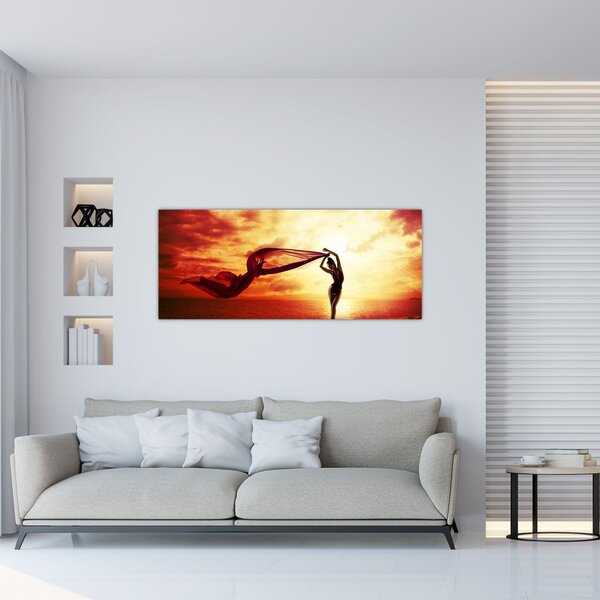 Tablou - Silueta femeii la apus de soare (120x50 cm)