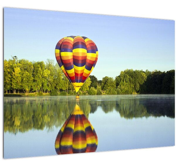 Tablou pe sticlă cu balon cu aer cald pe un lac (70x50 cm)