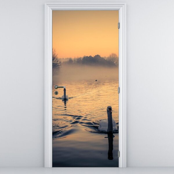 Fototapet pentru ușă - Lebede pe apă în ceață (95x205cm)