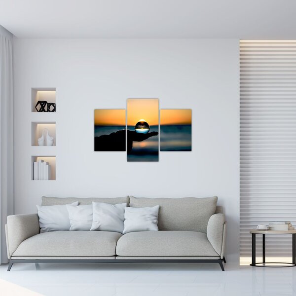 Tabloul cu bilă din sticlă în palmă (90x60 cm)