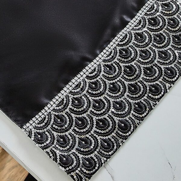 Suporturi pentru farfurii 4 buc. din material textil 30x46 cm Deco Sequin – Catherine Lansfield