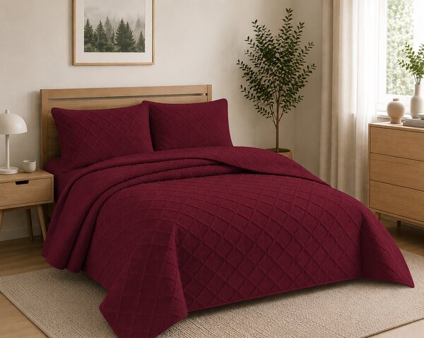 Cuvertura matlasata dimensiunea 160x230 cm si 1 fata de perna 50x70 cm, uni-model romburi, culoare grena