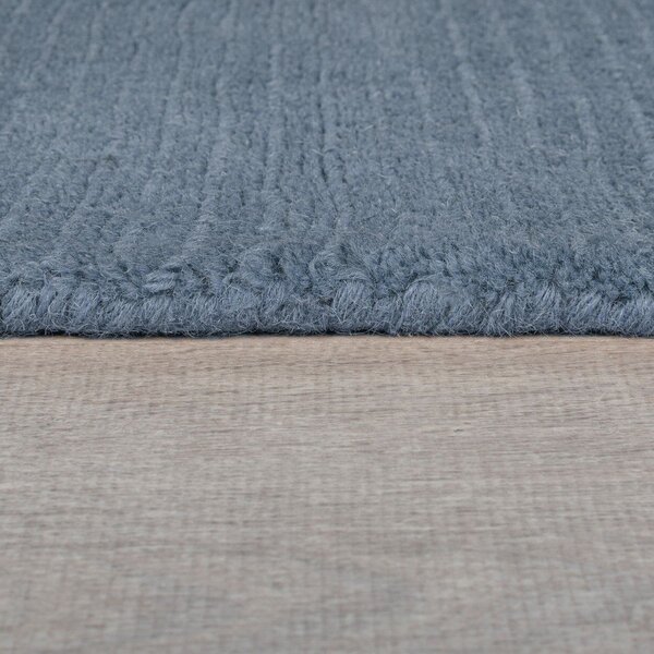 Covor albastru închis țesut manual din lână 120x170 cm Textured Wool Border – Flair Rugs