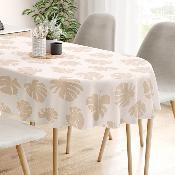 Goldea față de masă 100% bumbac - frunze tropicale pe bej - ovală 120 x 160 cm