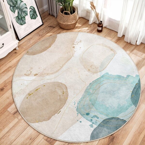 Covor albastru/bej lavabil rotund ø 100 cm Puddle – Mila Home
