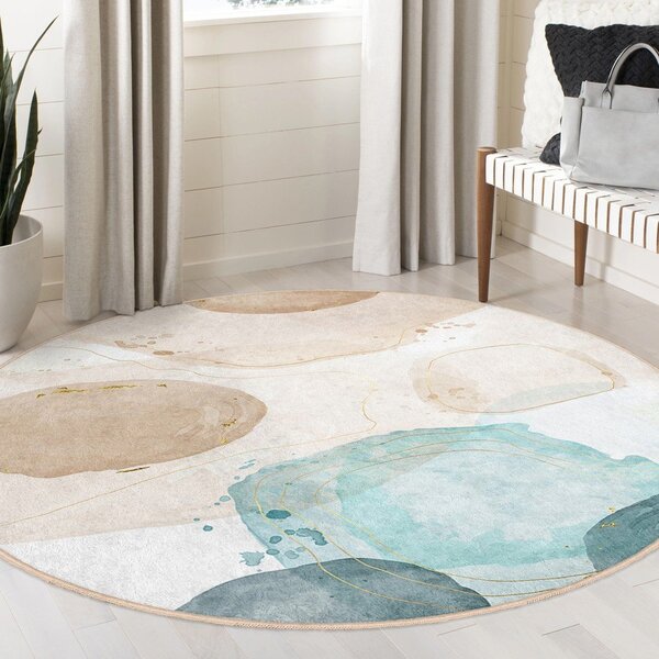 Covor albastru/bej lavabil rotund ø 100 cm Puddle – Mila Home