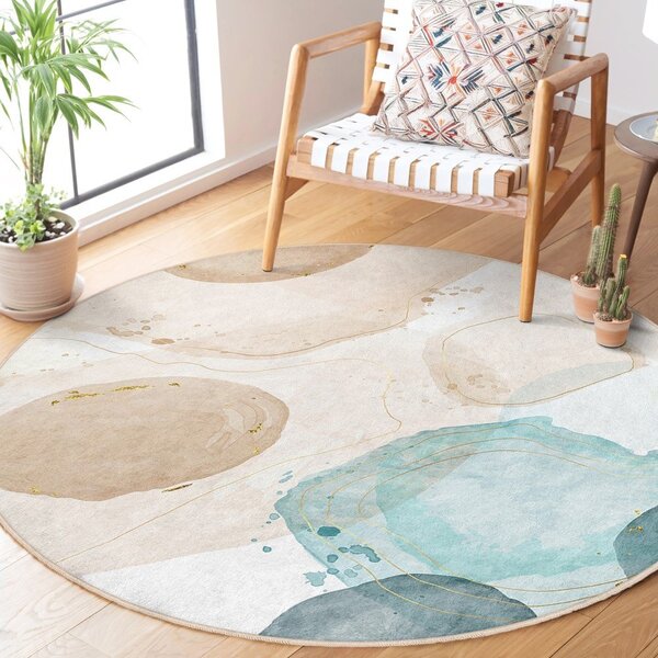 Covor albastru/bej lavabil rotund ø 100 cm Puddle – Mila Home