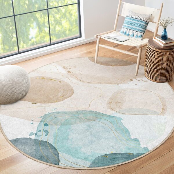 Covor albastru/bej lavabil rotund ø 100 cm Puddle – Mila Home