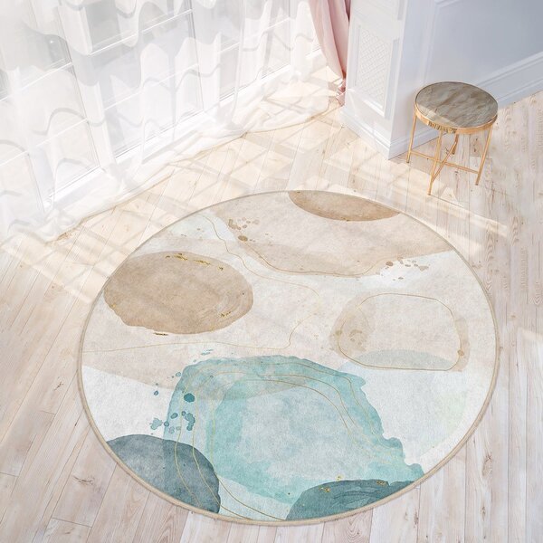 Covor albastru/bej lavabil rotund ø 100 cm Puddle – Mila Home