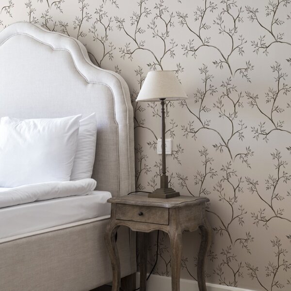 Tapet Ramuri delicate cu frunze pe un fundal crem cald, Tapet flori, a00597v1 : Uwalls.ro