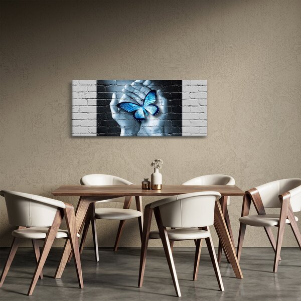 Tablou cu flutere albastru pe perete (120x50 cm)