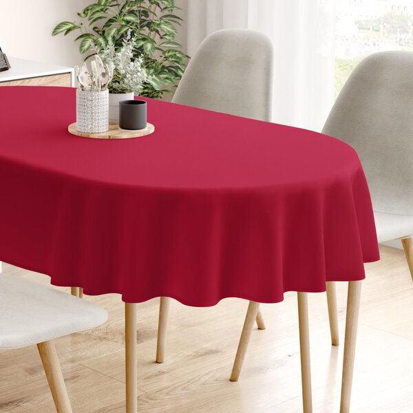 Goldea față de masă decorativă de crăciun loneta - uni roșu vișinie - ovale 140 x 200 cm