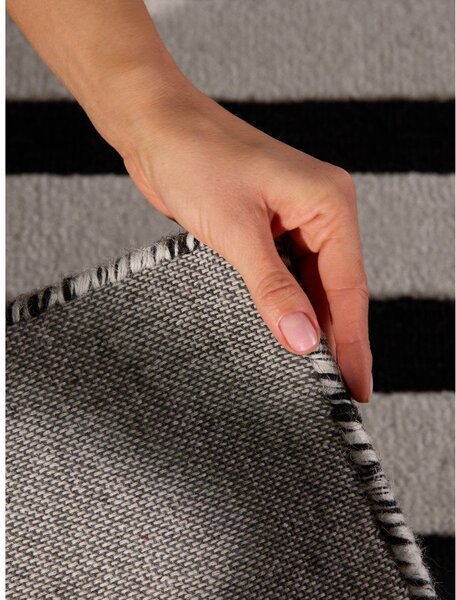 Covor alb-negru țesut manual din lână 120x180 cm Stryve Noir – Elle Decoration