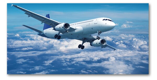 Fotografie imprimată pe sticlă Avionul în nori