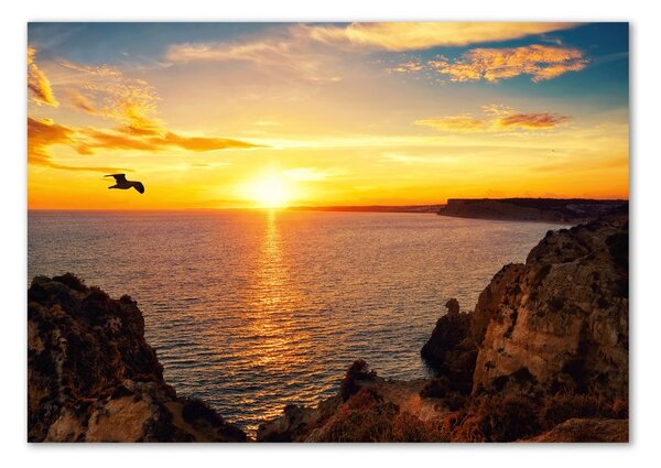 Fotografie imprimată pe sticlă Apus de soare pe mare