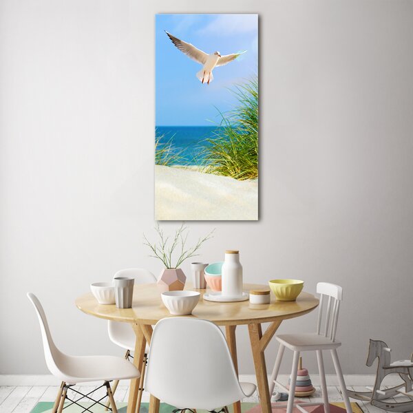 Tablou pe pe sticlă Seagull peste dune